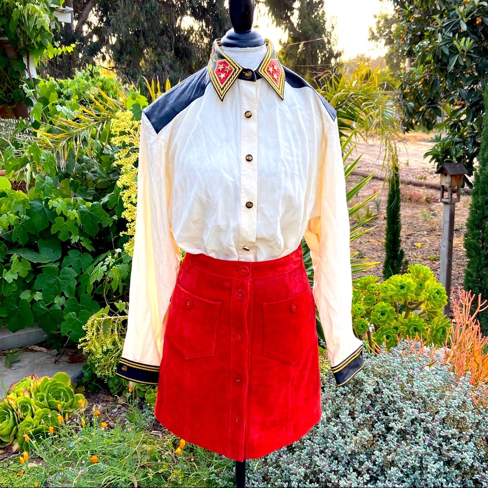 Silk and leather Cache blouse with stars and crown